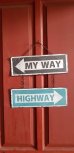 Decorative Image with a sign pointing left reading "my way" and a further sign pointing right reading "highway"